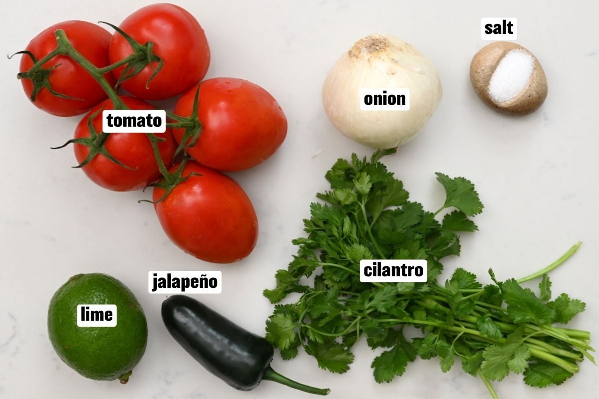 A photo of the ingredients for making pico de gallo. - 11