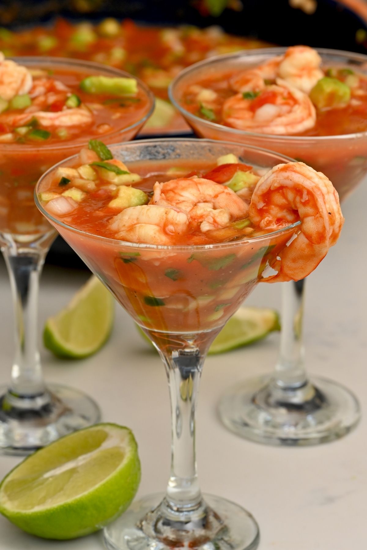Mexican shrimp cocktail served in a large clear bowl.