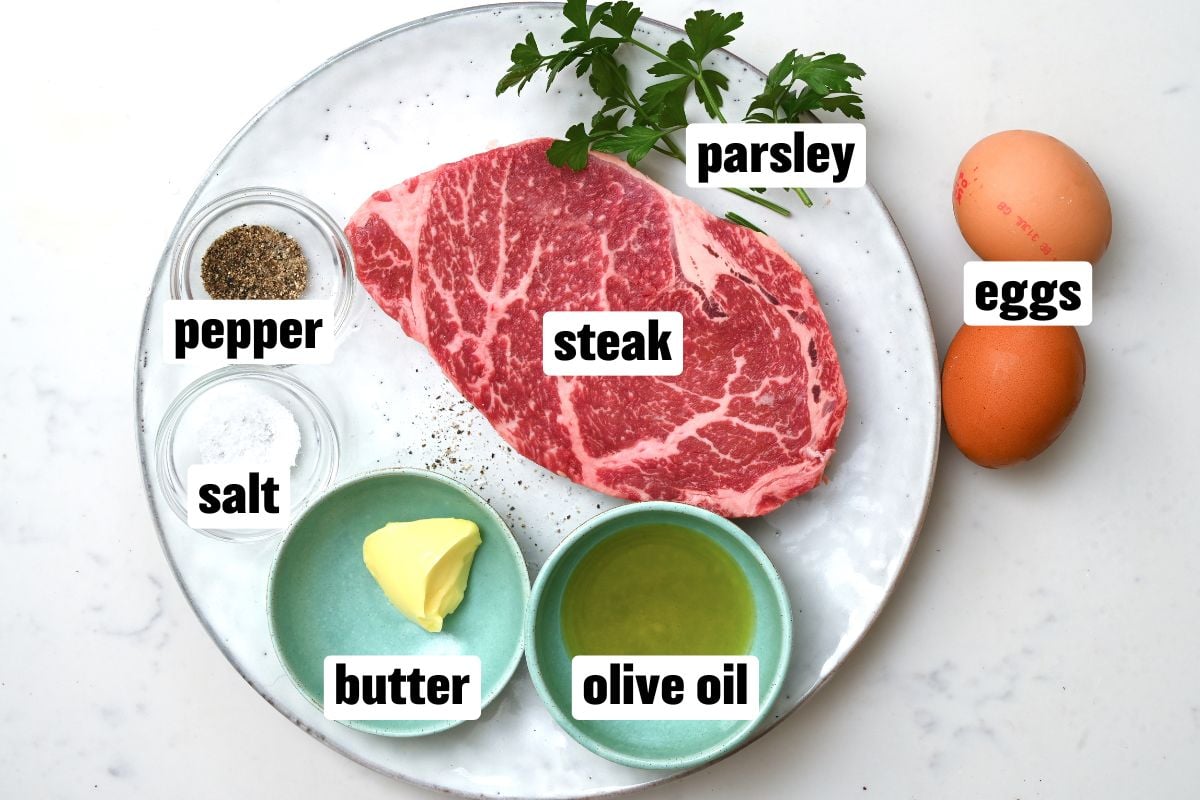 A photo of the ingredients needed ot make steak and egg breakfast. - 2