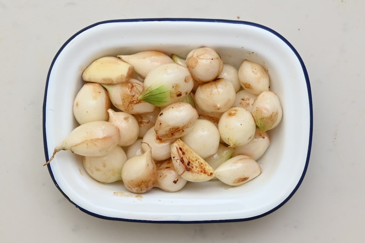 Lightly browned pearl onions set aside after sautéing, ready to add to beef bourguignon. - 16