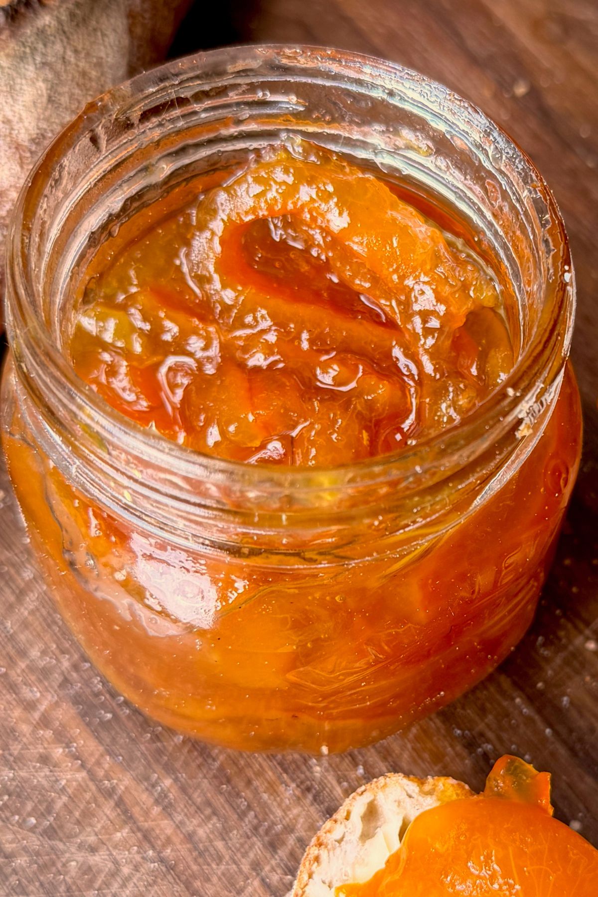 Close-up photo of jar of homemade orange marmalade. - 1