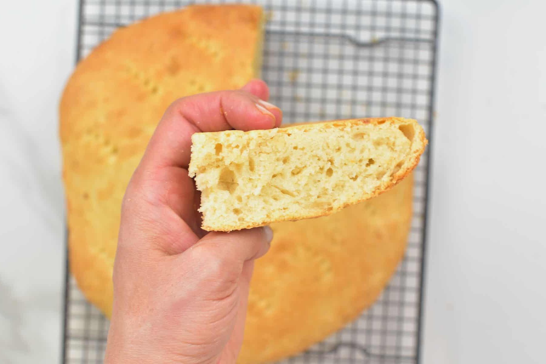 Coconut Bake with a piece cut off.