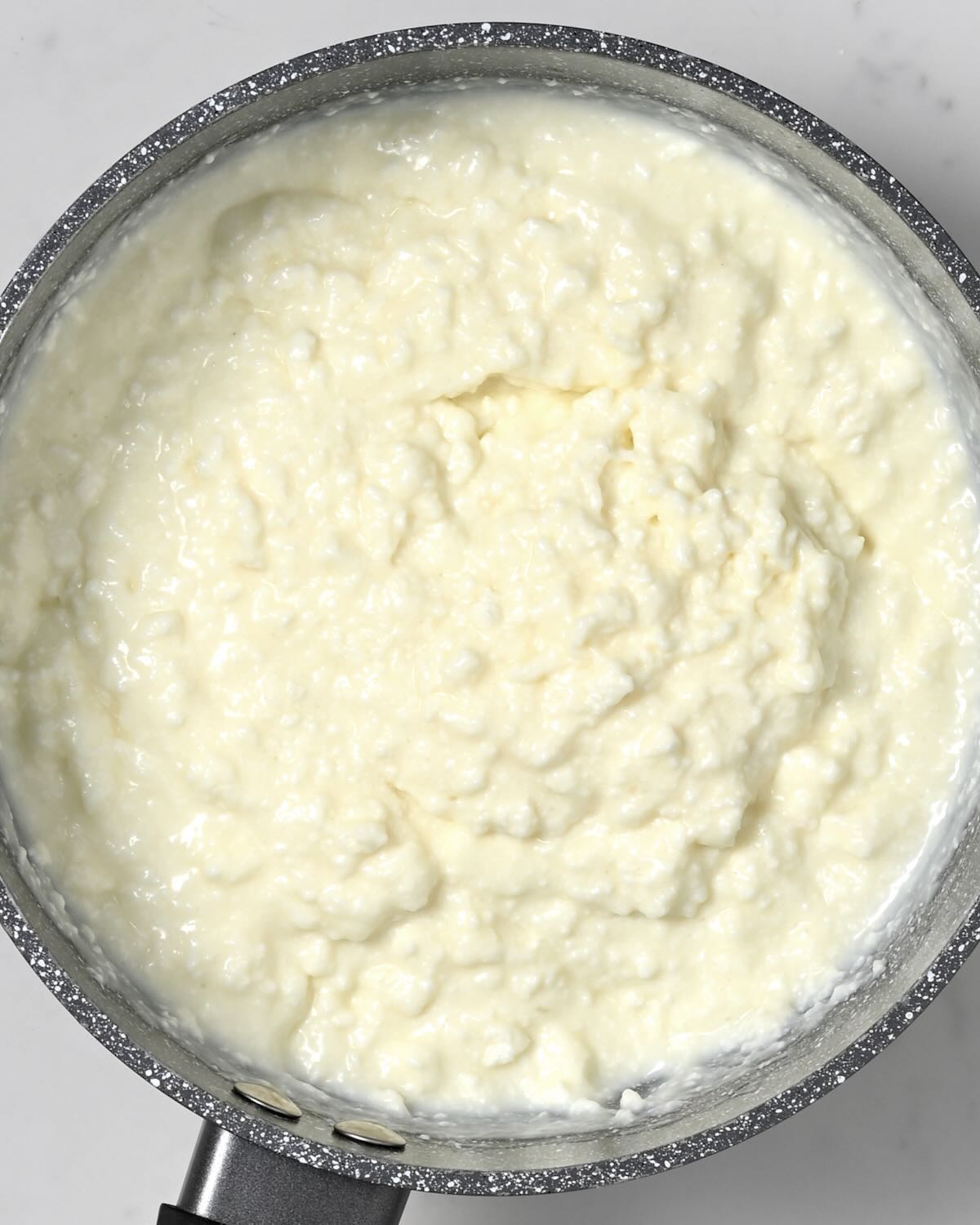 Homemade ashta in a small saucepan. - 1