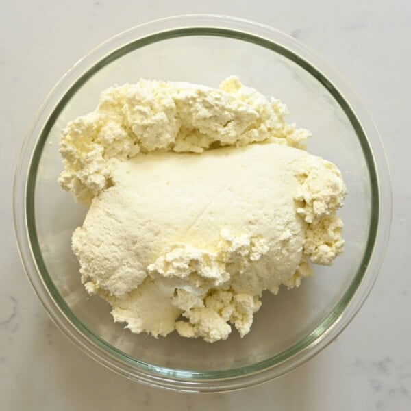Cheese curds in a large bowl.