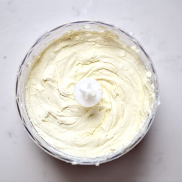 Homemade cream cheese blended in a small blender.