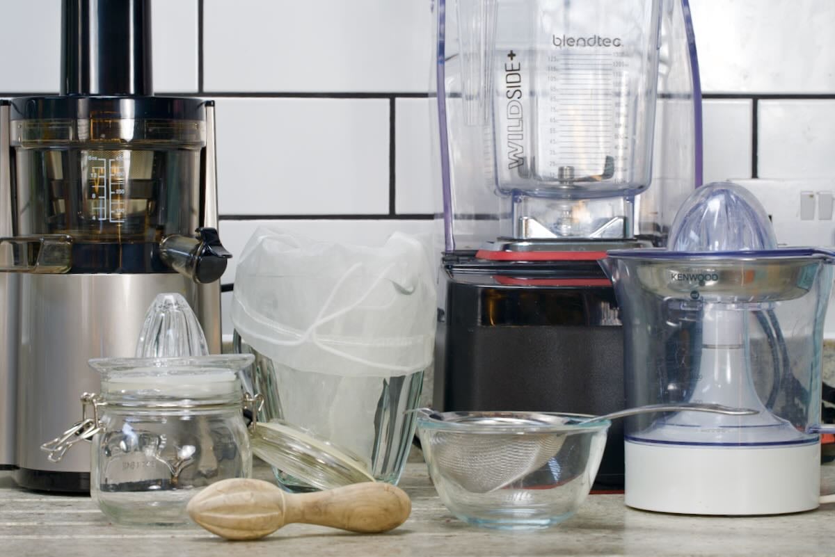 Tools to choose from to make orange juice at home.