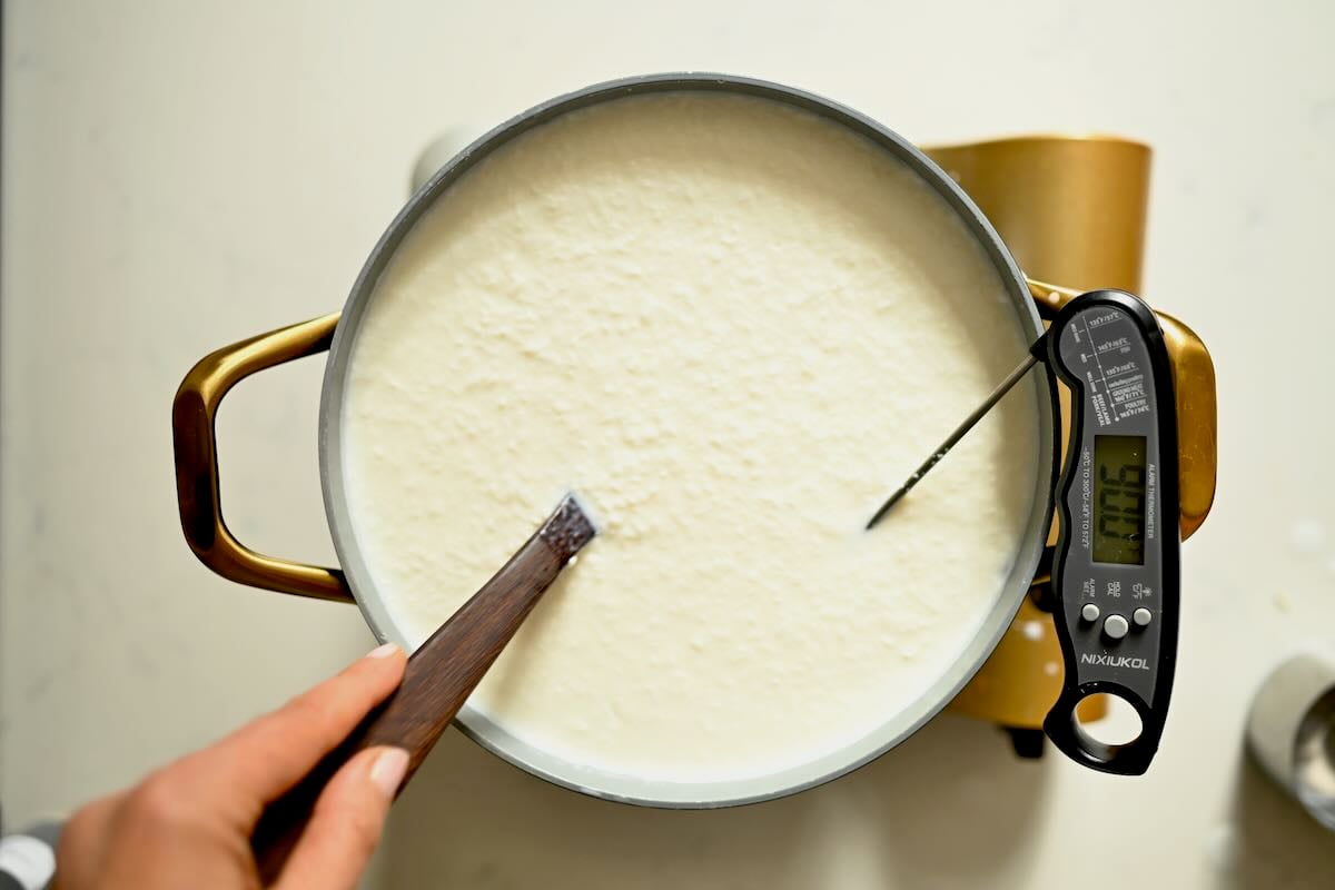 Heating milk to 90 degrees F.