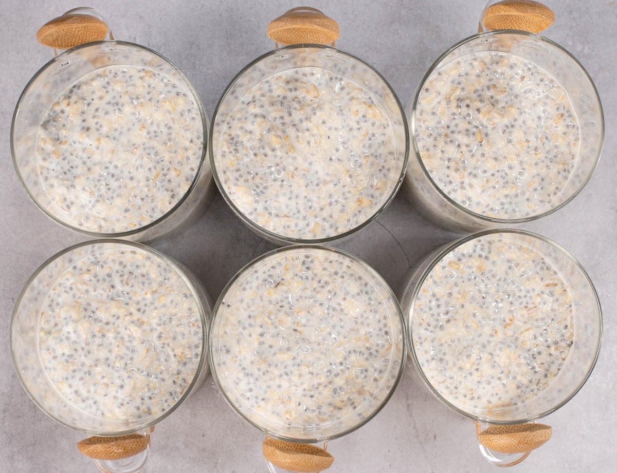 top view of 6 overnight oat jars ready for toppings