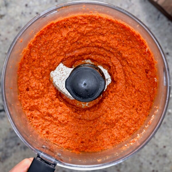 Muhammara dip processed in the food processor.