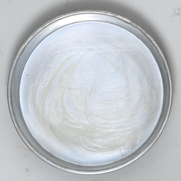 A baking pan greased with some butter.