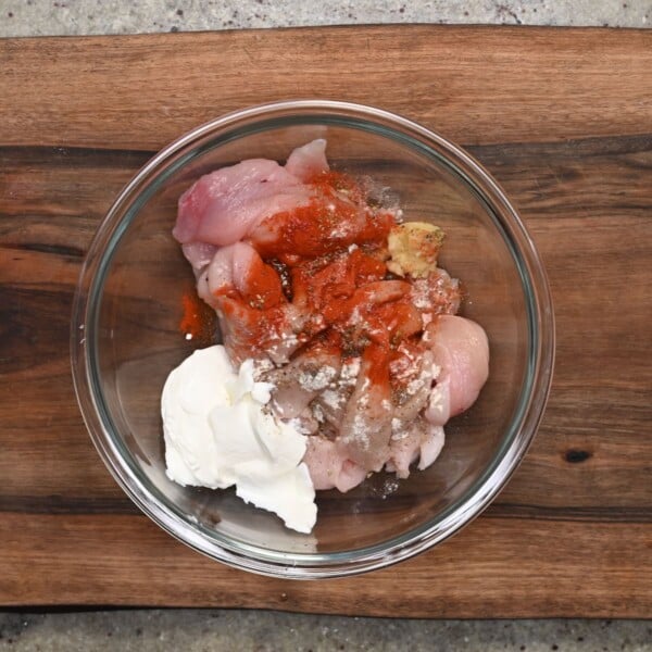 Marinade ingredients added to a bowl.