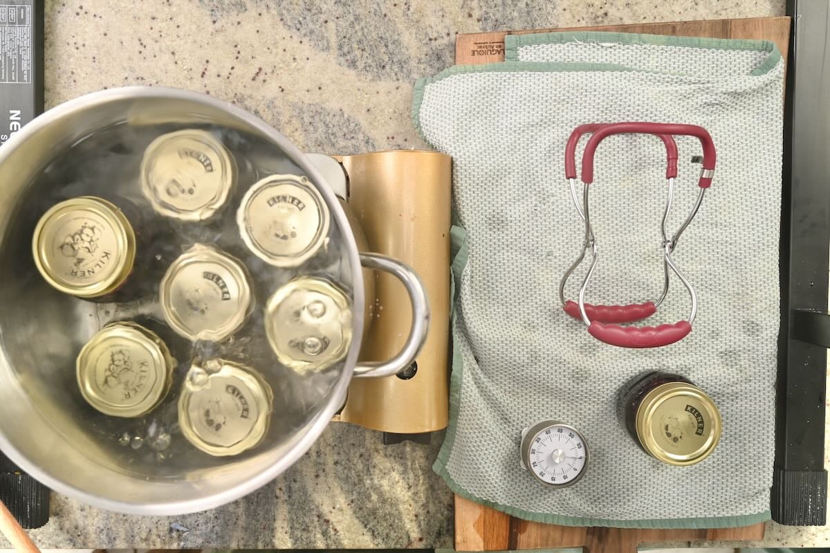 Water bath canning cherry jam.