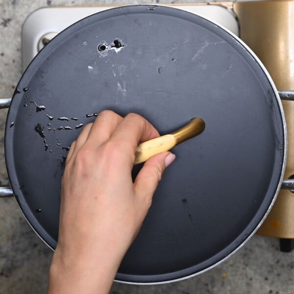 Cooking chicken biryani with the lid on.