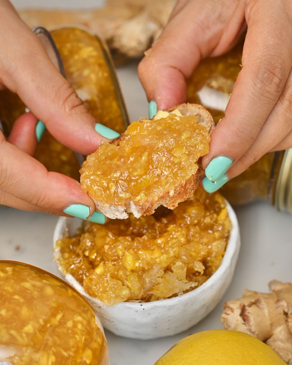 Ginger jam on a small piece of toasted bread.