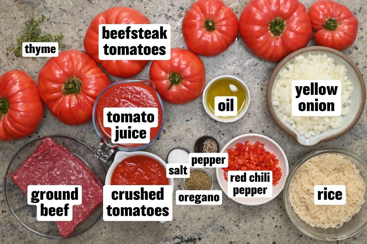 Ingredients needed to make rice-and-ground-beef stuffed tomatoes.